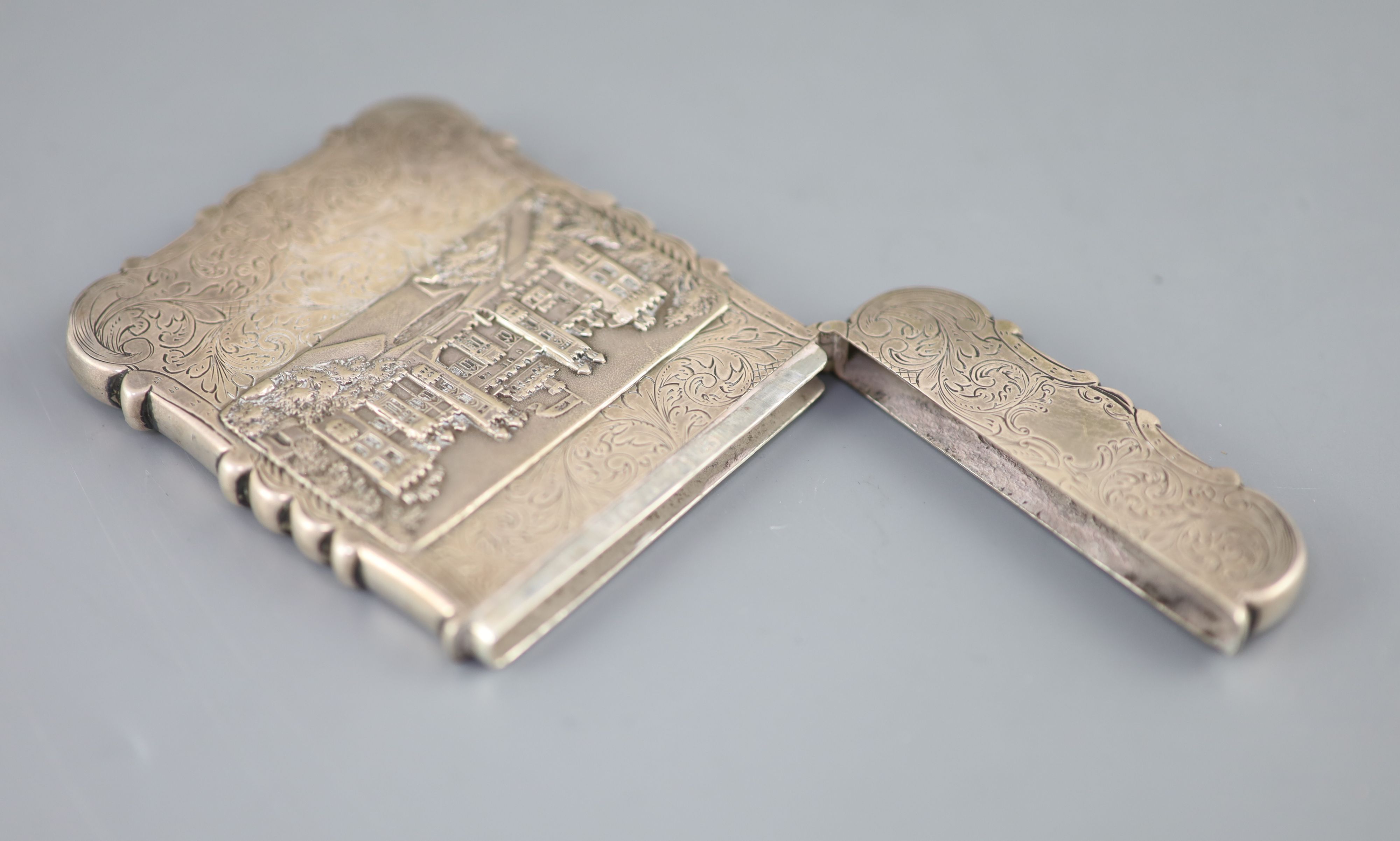 An early Victorian silver double sided castle top card case, depicting views of Windsor and Abbotsford castles,
